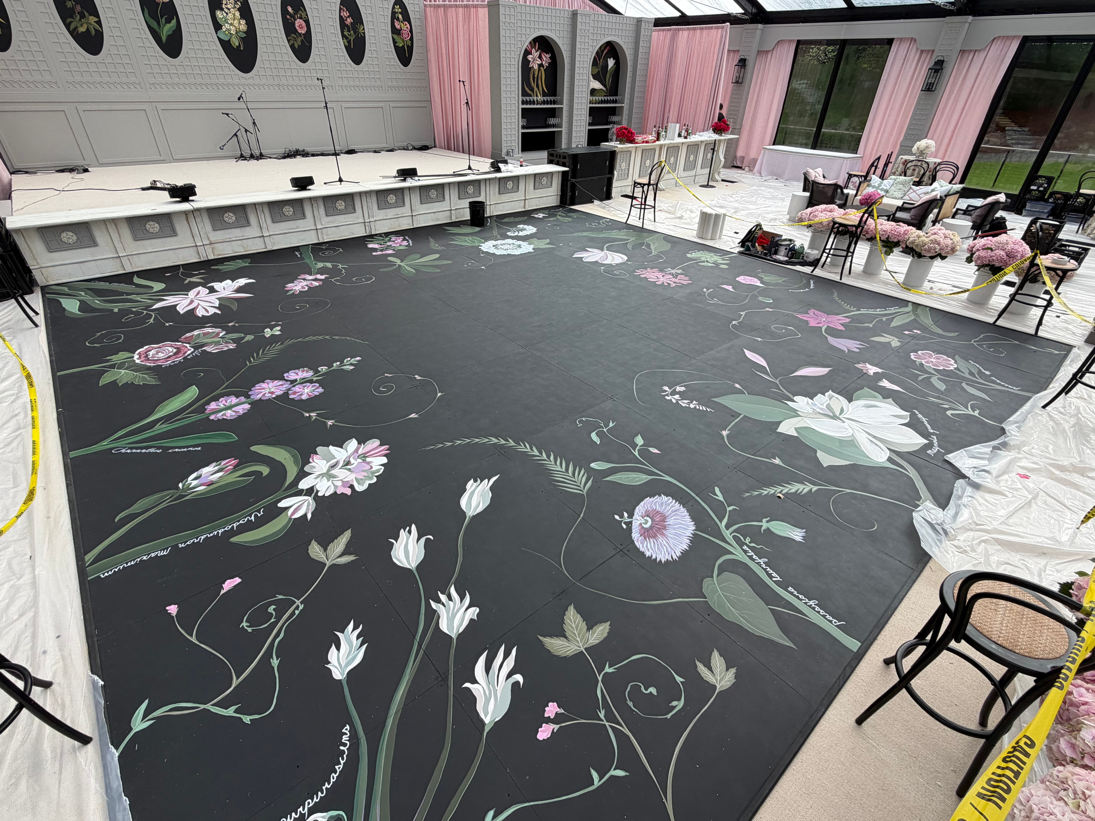 Botanical dance floor mural installed at event venue