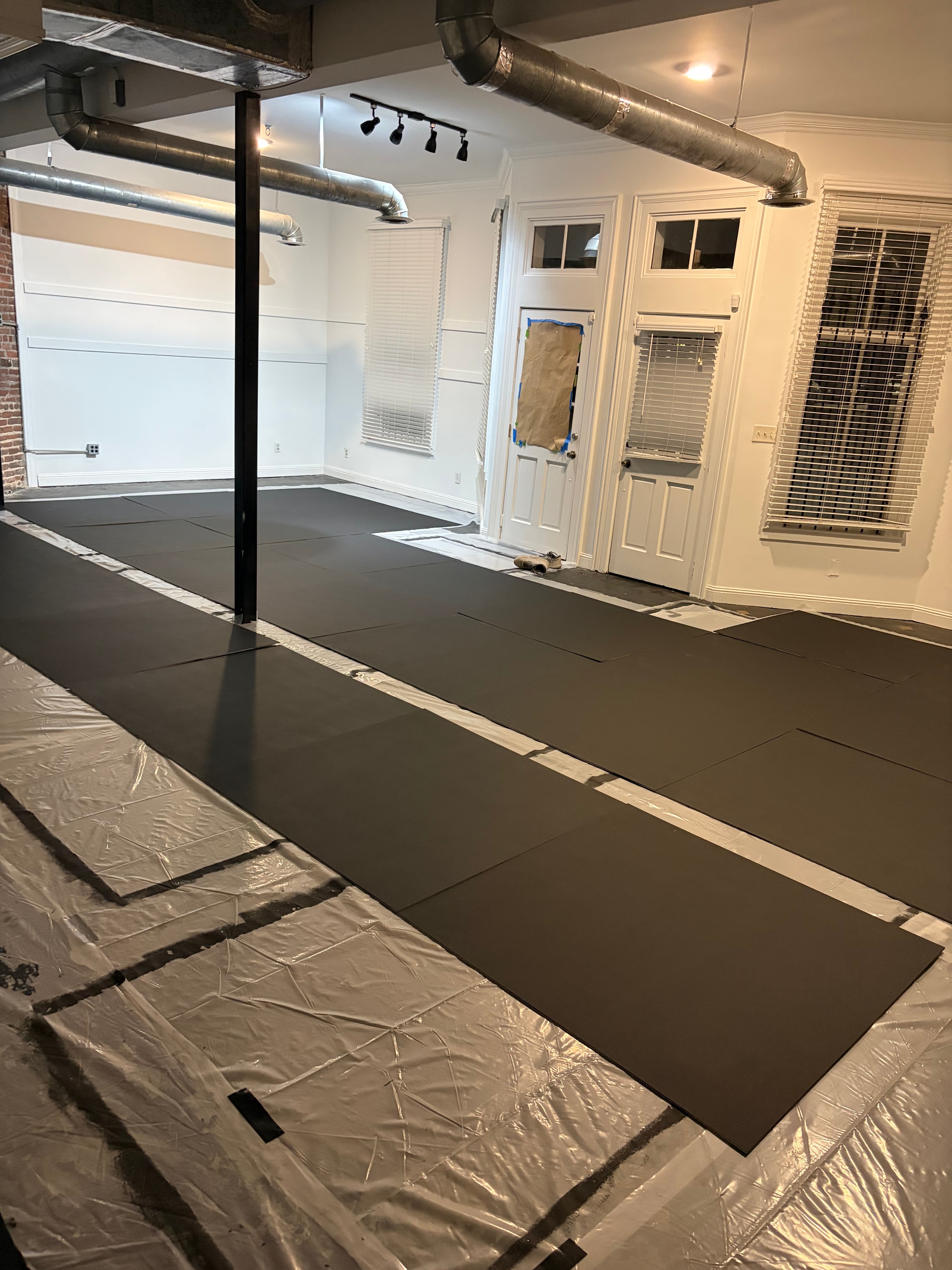 Dance floor panels being installed in venue